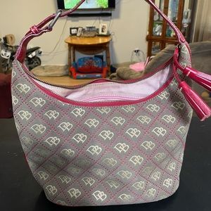 Small bucket style purse with matching wristlet.